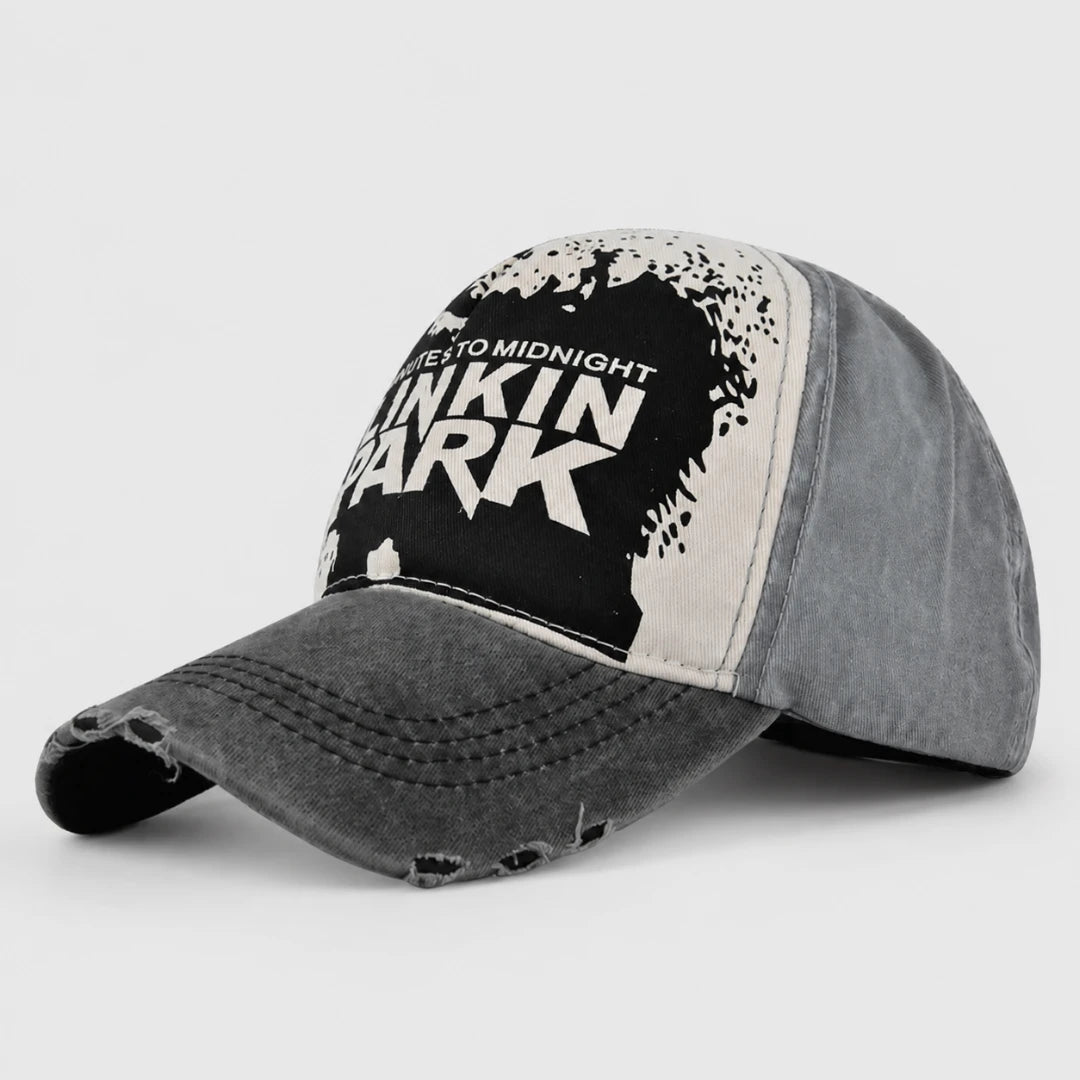 Josh & Tate - DistressedCap™ Embroidered Baseball Cap - A distressed baseball cap featuring a black and white graphic print on the front panel with the text 'DUE TO MIDNIGHT IN KIN PARK' and '2025'. The cap has a washed gray brim with frayed distressing and gray side panels, shown on a light gray background.