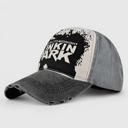 Josh & Tate - DistressedCap™ Embroidered Baseball Cap - A distressed baseball cap featuring a black and white graphic print on the front panel with the text 'DUE TO MIDNIGHT IN KIN PARK' and '2025'. The cap has a washed gray brim with frayed distressing and gray side panels, shown on a light gray background.
