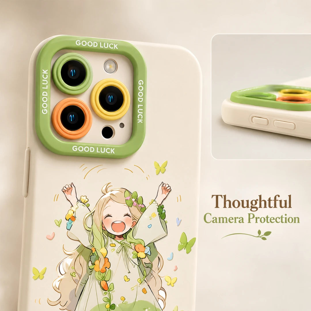 Josh & Tate - DoodleBloom™ iPhone Case - A phone case with a green camera frame labeled 'GOOD LUCK' and a whimsical illustrated girl with flowers and butterflies on the back, shown on a light beige background with a small inset detail of the camera protection and text reading 'Thoughtful Camera Protection'.