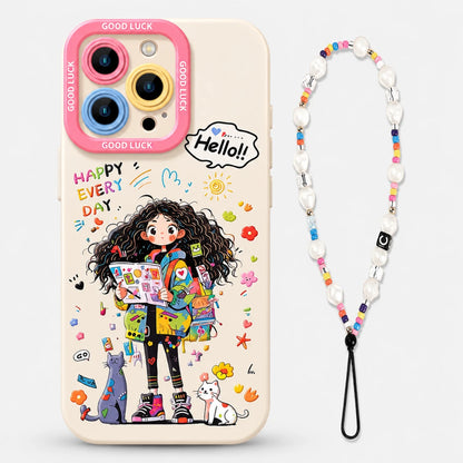 Josh & Tate - DoodleBloom™ iPhone Case - A cream-colored phone case featuring a colorful cartoon illustration of a girl with curly hair, surrounded by doodles and the text 'HAPPY EVERY DAY' and 'Hello!'. The case has a pink camera border with 'GOOD LUCK' written on it and is shown next to a matching beaded phone strap with white pearls and colorful beads.