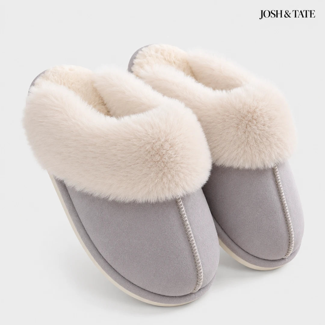 Josh & Tate - DriftWalk™ Plush Slippers - Gray slippers with white fur lining on a light gray background, featuring the brand 'Josh & Tate'.