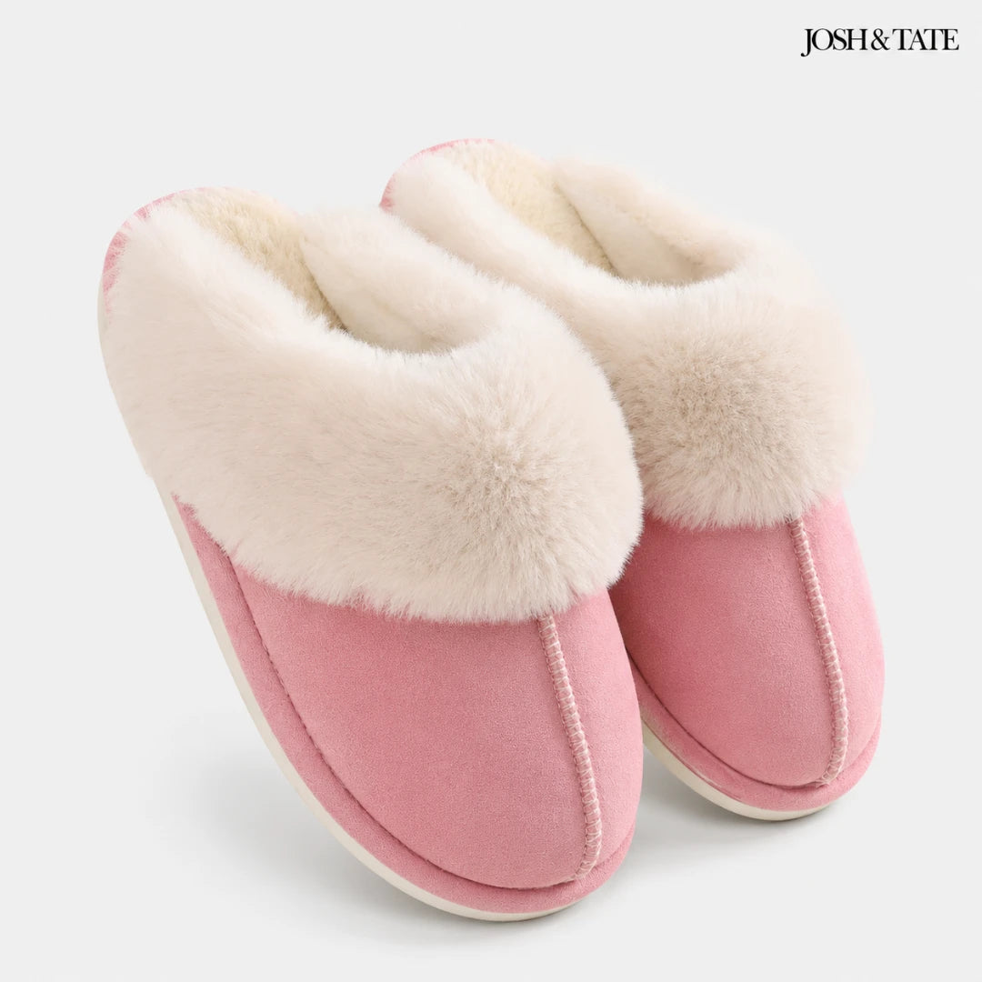 Josh & Tate - DriftWalk™ Plush Slippers - Pink slippers with white fur trim on a light gray background, featuring the brand 'Josh & Tate'.