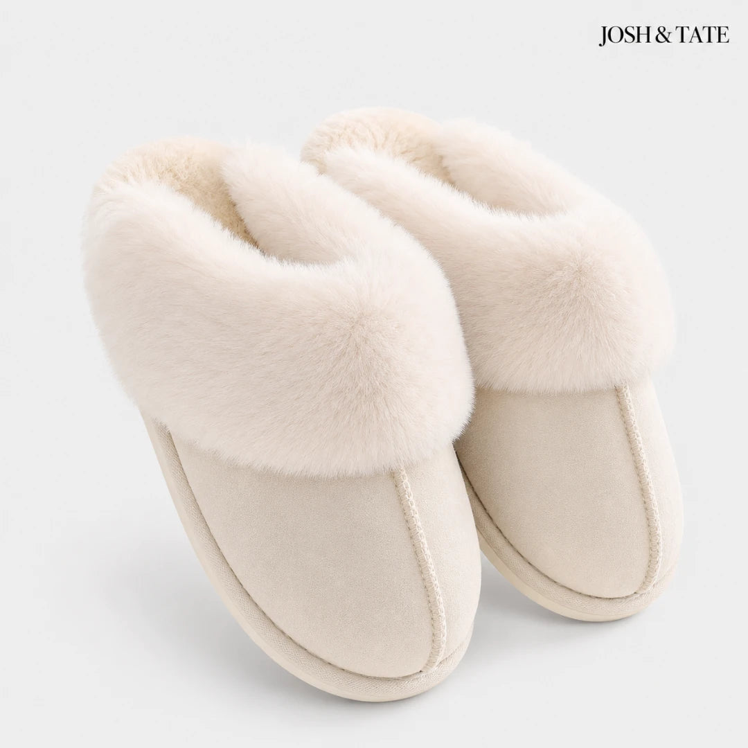 Josh & Tate - DriftWalk™ Plush Slippers - Pair of beige slippers with fluffy interior on a white background, branded 'Josh & Tate'.