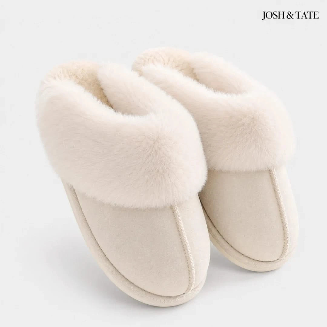 Josh & Tate - DriftWalk™ Plush Slippers - Pair of beige slippers with fluffy interior on a white background, branded 'Josh & Tate'.