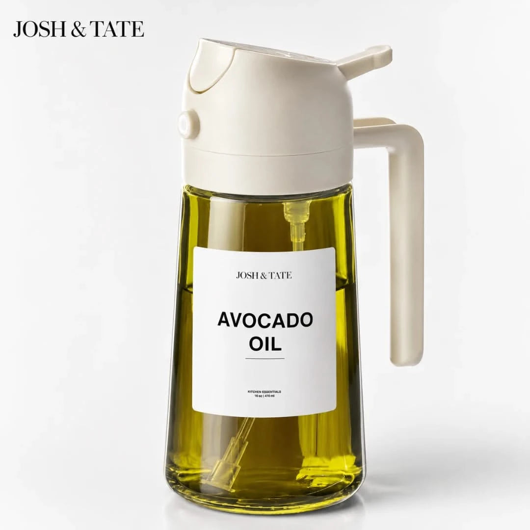 Josh & Tate - DripMist™ 2-in-1 Oil Dispenser - Glass bottle of avocado oil with a white label and beige lid on a light gray background, featuring the brand 'Josh & Tate'.