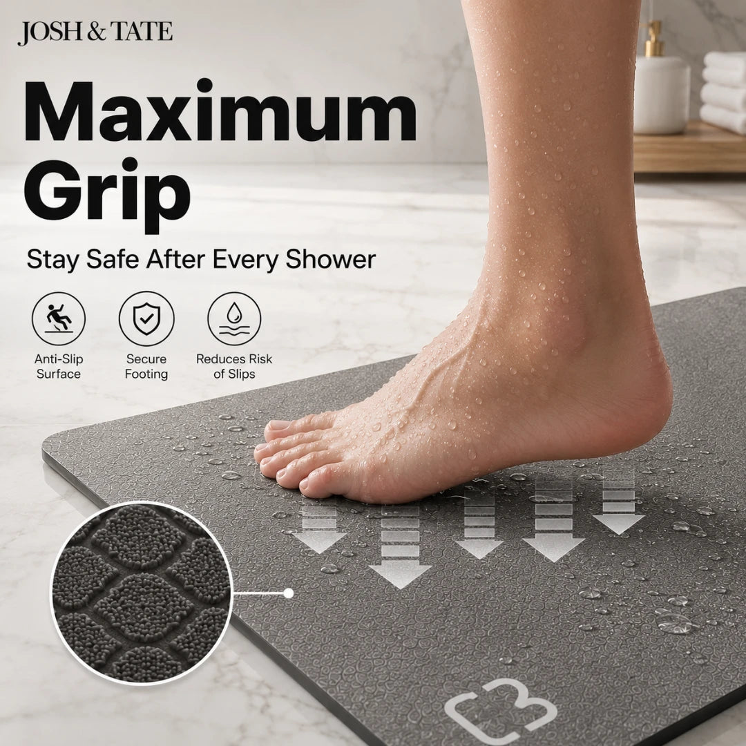 Josh & Tate - DryStep™ Diatomite Non-Slip Bath Mat - Gray non-slip mat with a foot on it, labeled 'Maximum Grip' by Josh & Tate.