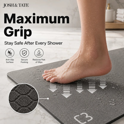 Josh & Tate - DryStep™ Diatomite Non-Slip Bath Mat - Gray non-slip mat with a foot on it, labeled 'Maximum Grip' by Josh & Tate.