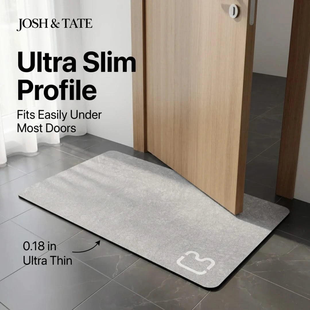 Josh & Tate - DryStep™ Diatomite Non-Slip Bath Mat - Gray doormat with 'Josh & Tate' branding on a tiled floor.