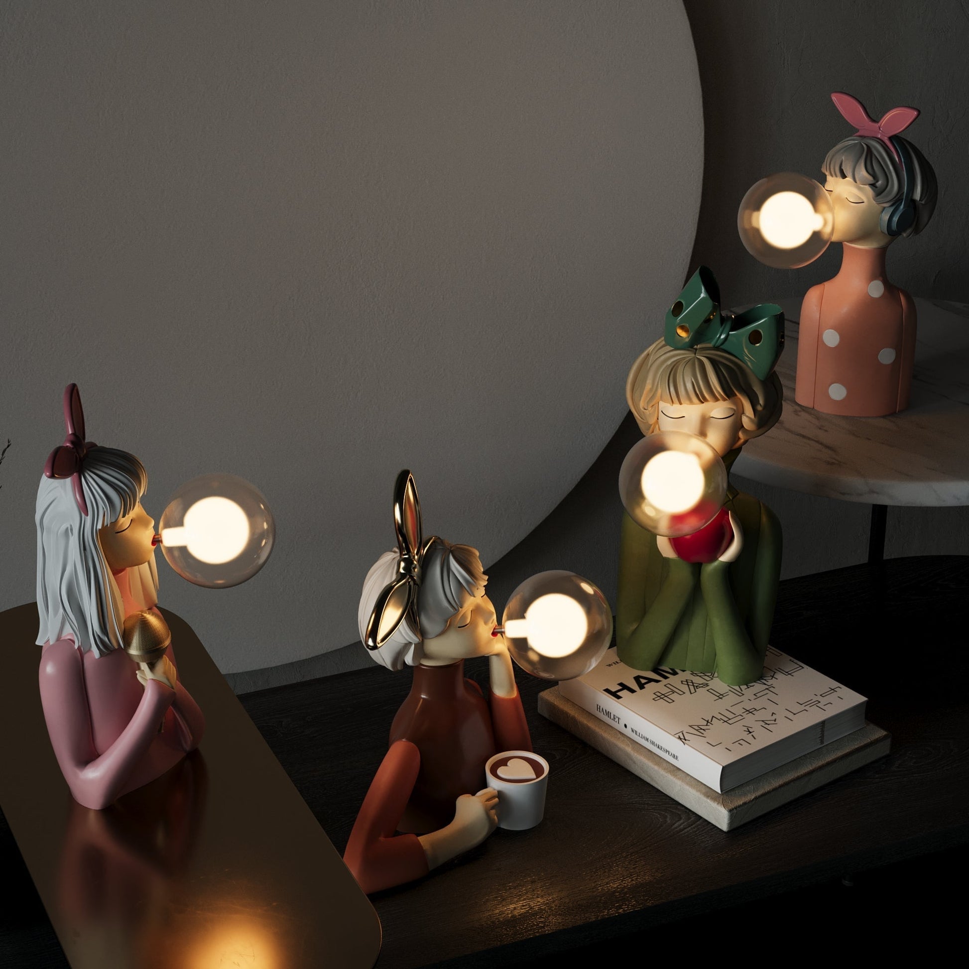Three decorative lamps shaped like people on a table with a dark background