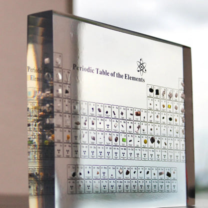 Josh & Tate - Elementa Periodic Table - Periodic Table of Elements display with various elements on a metallic surface.