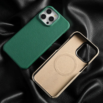 Two phone cases, one green and one beige, on a black textured background