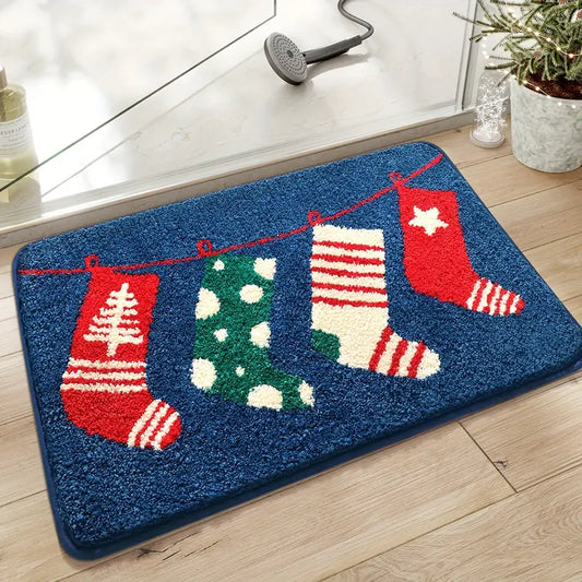 A Christmas Stockings Bath Rug with colorful, patterned stockings hanging on a rope against a blue background, placed on a bathroom floor.