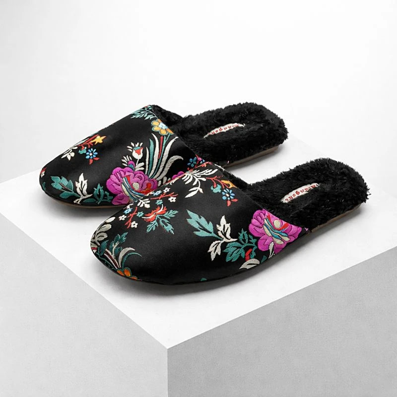 Josh & Tate - FloraStep™ Satin Fur-Lined Slipper - Black slippers with colorful floral embroidery on a white background