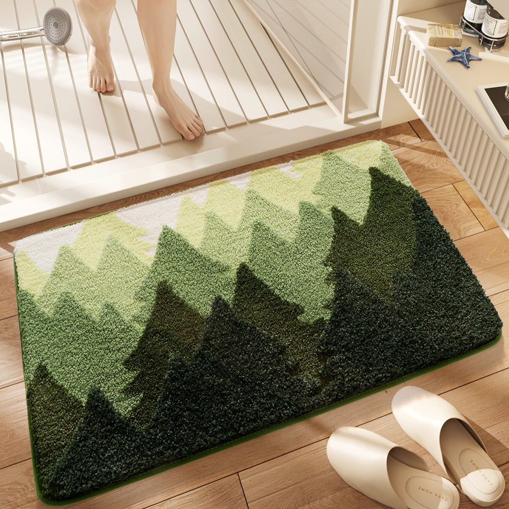Green mountain-patterned rug on a wooden floor with white shoes nearby