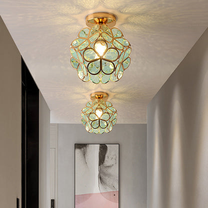 Decorative ceiling lights with floral design in a room setting.