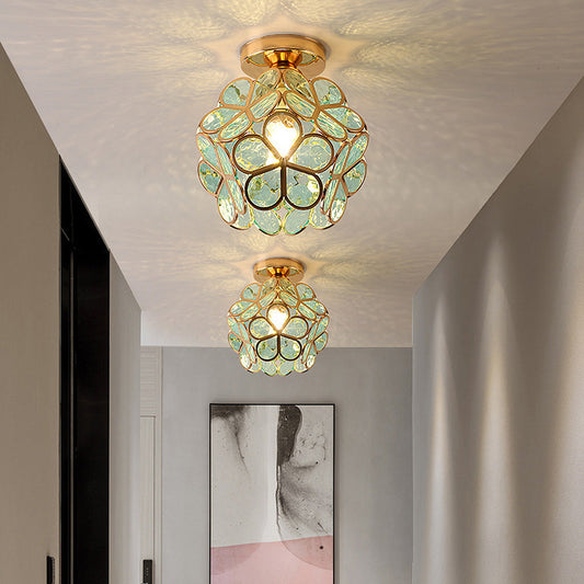 Decorative ceiling lights with floral design in a room setting.
