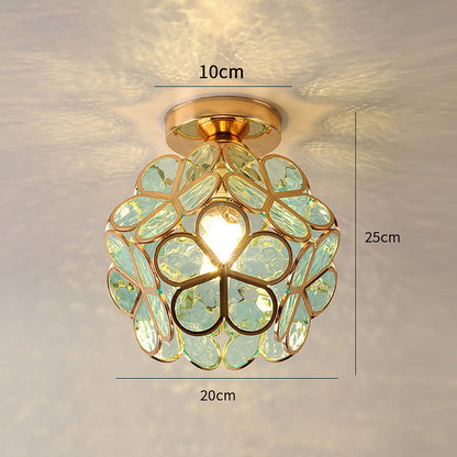 Ceiling light fixture with decorative glass shade and measurements on a neutral background