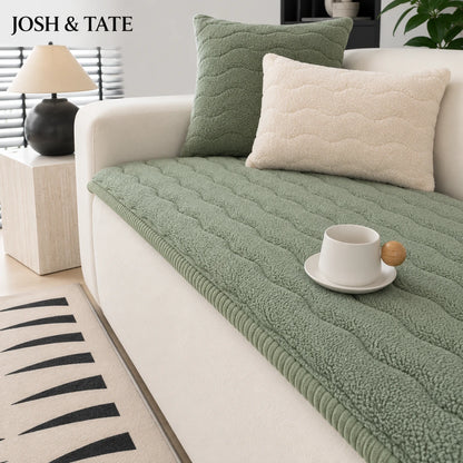 Josh & Tate - FluffLayer™ Plush Sofa Pad - Green sofa cover on a white sofa with cushions and a cup of coffee in a cozy living room.