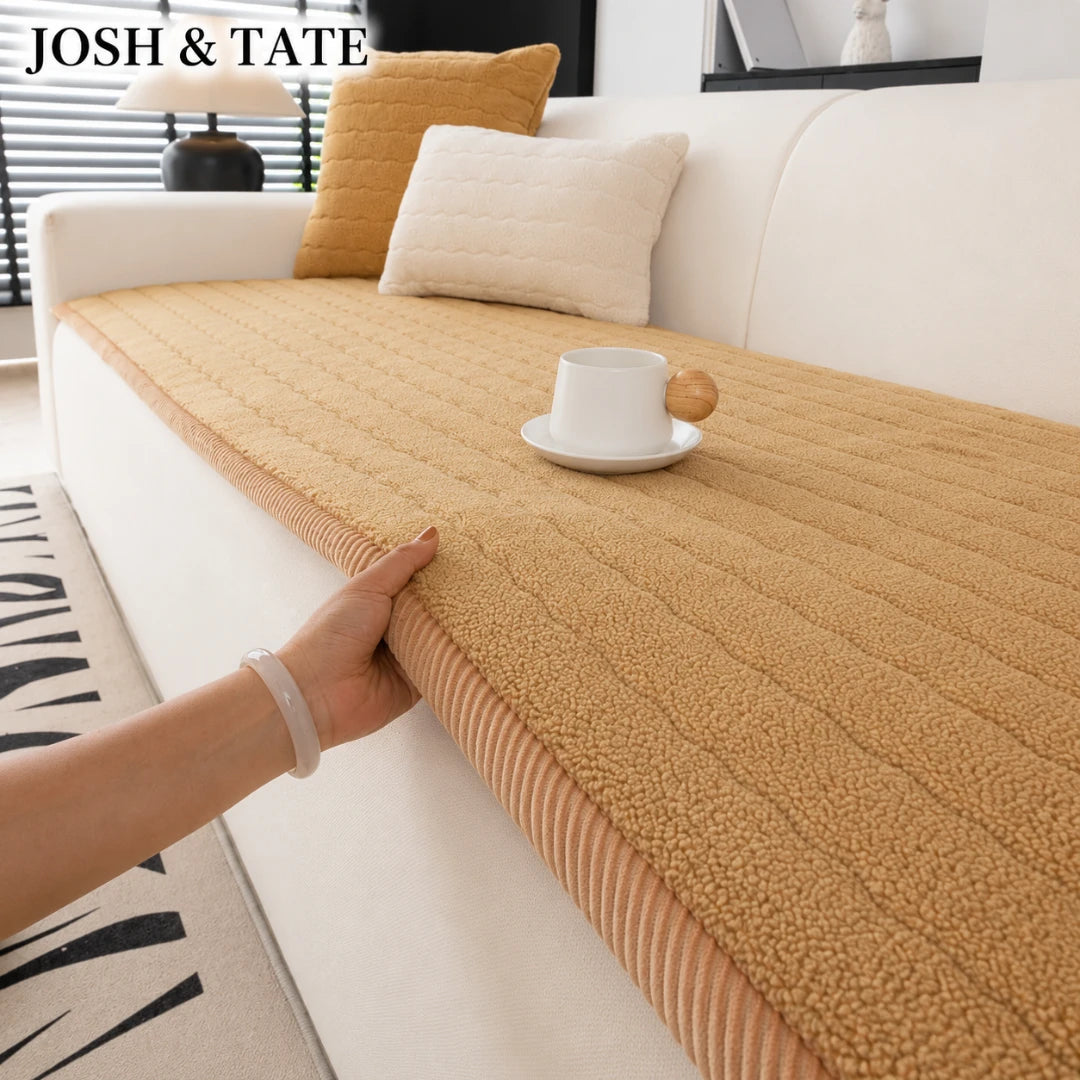 Josh & Tate - FluffLayer™ Plush Sofa Pad - Yellow textured sofa cover being adjusted on a white sofa with 'JOSH & TATE' branding.