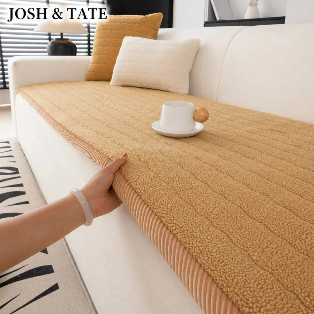 Josh & Tate - FluffLayer™ Plush Sofa Pad - Yellow textured sofa cover being adjusted on a white sofa with 'JOSH & TATE' branding.