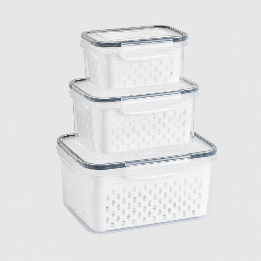 Josh & Tate - FreshBasket™ 3-in-1 Storage Set - Three nested clear plastic storage baskets with perforated white bases and transparent lids, shown on a light gray background.