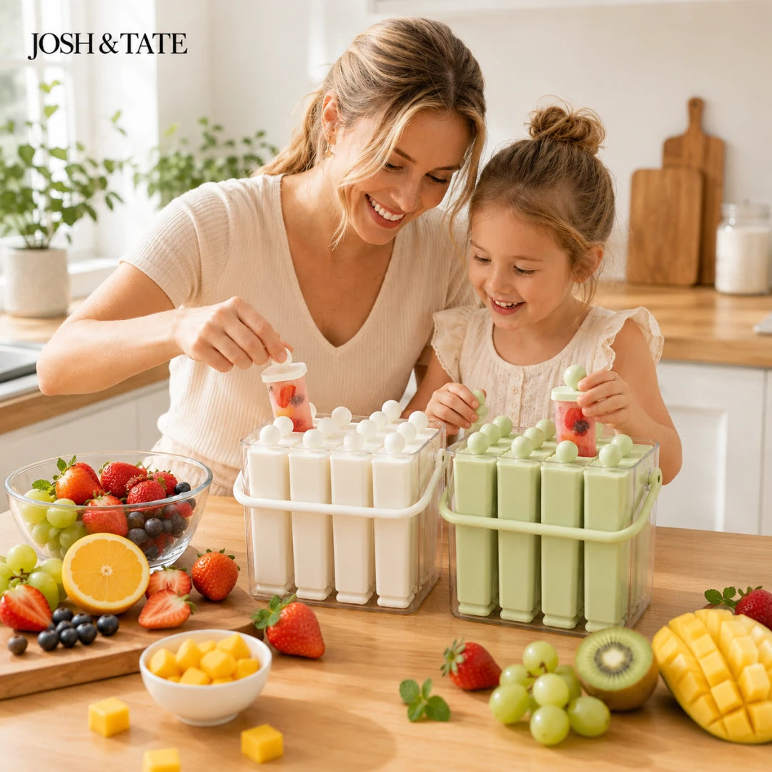 Josh & Tate - FrostPop™ 2-in-1 Popsicle Maker - Woman and child making ice cream in a kitchen with various fruits on the counter.