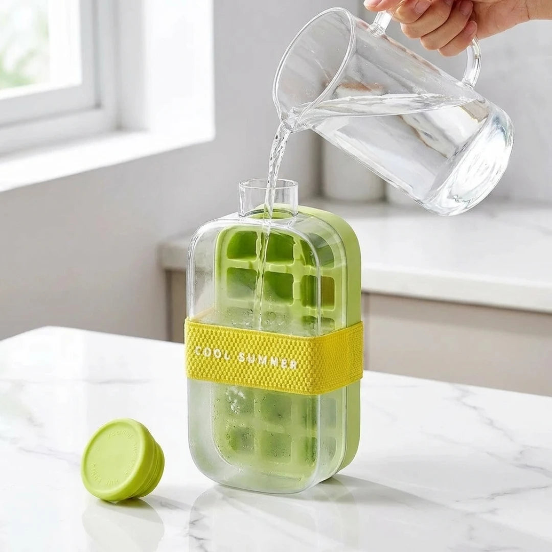 Josh & Tate - FrostPour™ 2-in-1 Ice Cube Tray & Drinking Bottle - Green ice cube tray with yellow band being filled with water on a white surface.