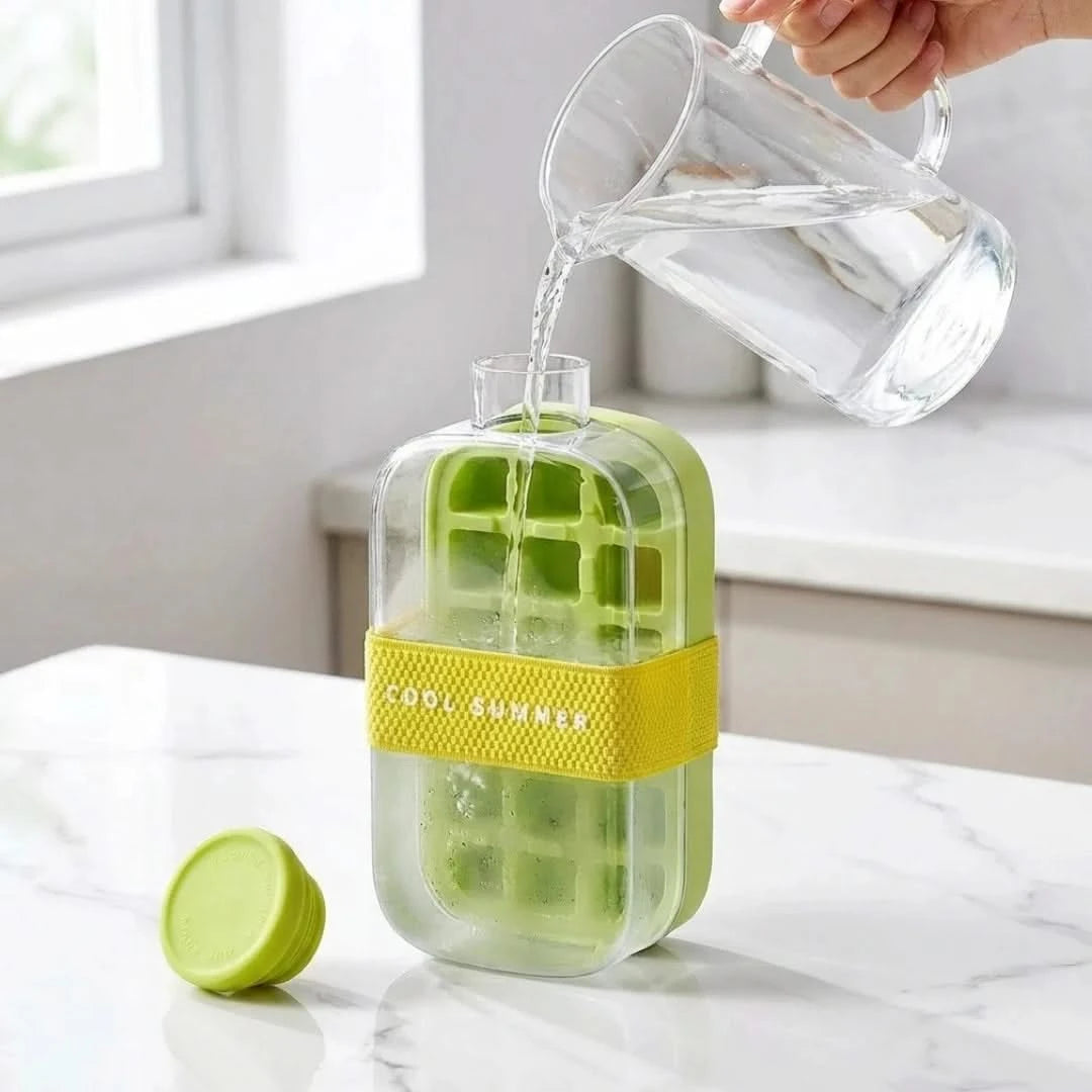 Josh & Tate - FrostPour™ 2-in-1 Ice Cube Tray & Drinking Bottle - Green ice cube tray with yellow band being filled with water on a white surface.