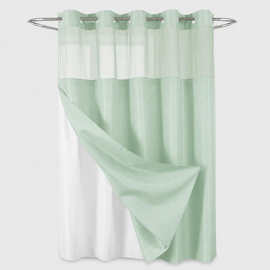 Josh & Tate - GlideCurtain™ No-Hook Shower Curtain - A two-tone shower curtain in mint green and white, featuring a solid lower section and a sheer mesh upper panel with grommets, hanging from a silver metal rod against a light gray background.