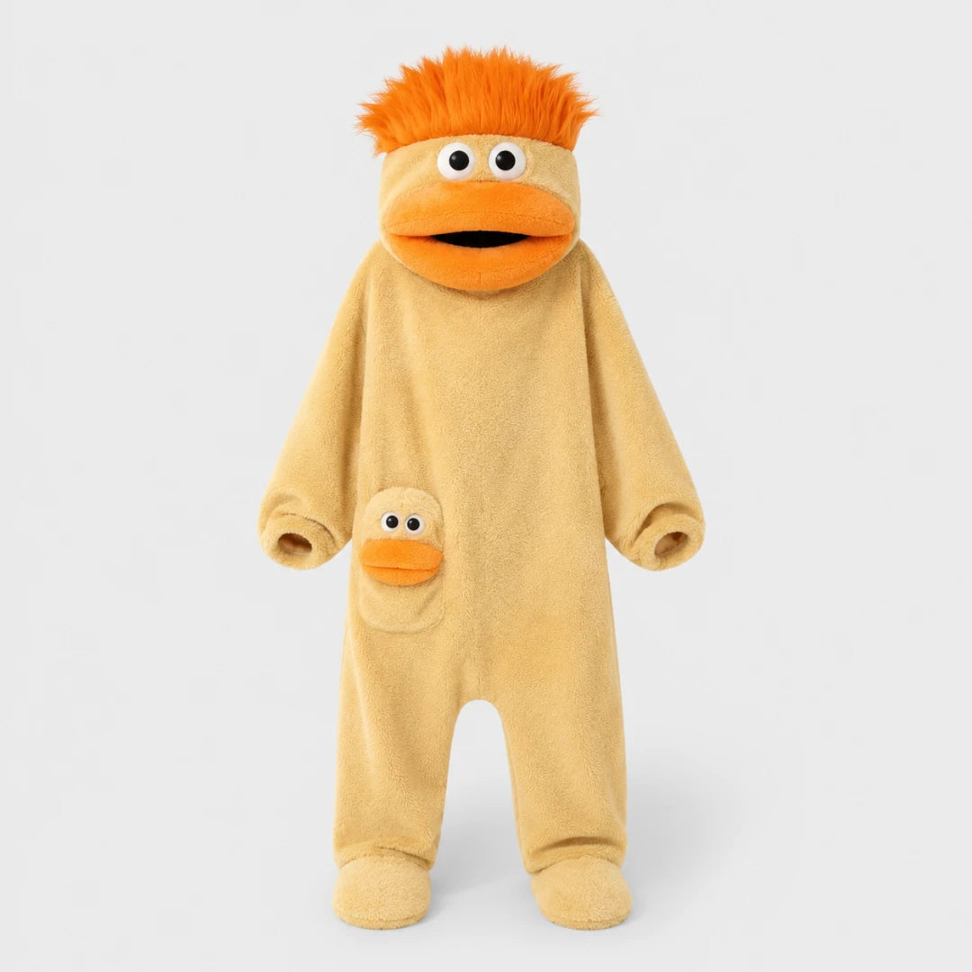 Josh & Tate - GoofSuit™ Big Mouth Monster Onesie - A plush duck character costume or doll featuring orange hair, a beige body, and a front pocket with a small duck face detail, photographed against a light gray studio background.
