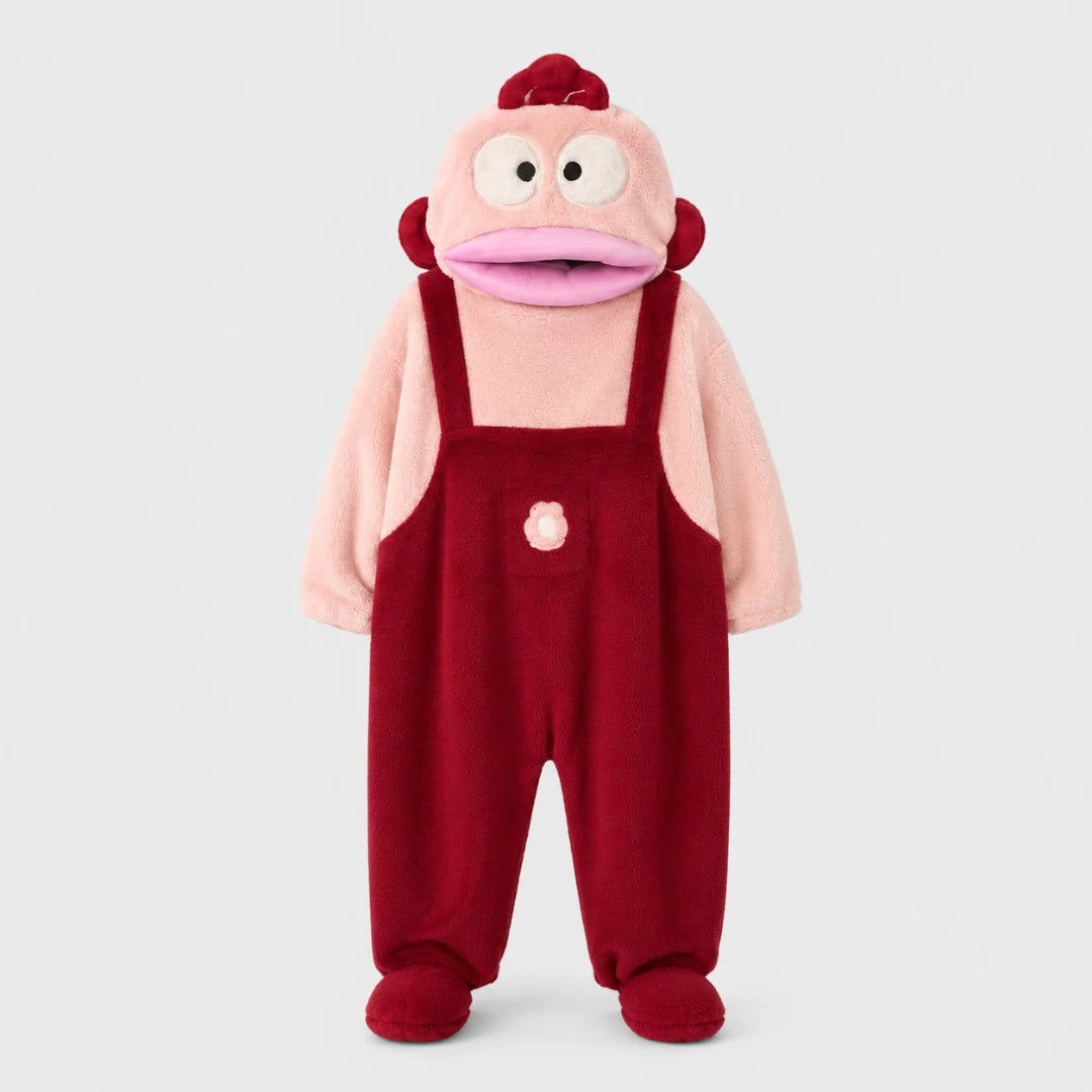 Josh & Tate - GoofSuit™ Big Mouth Monster Onesie - A plush baby costume featuring a pink monkey head with large eyes and a pink mouth, wearing red overalls with a small pink button detail, set against a plain light gray background.