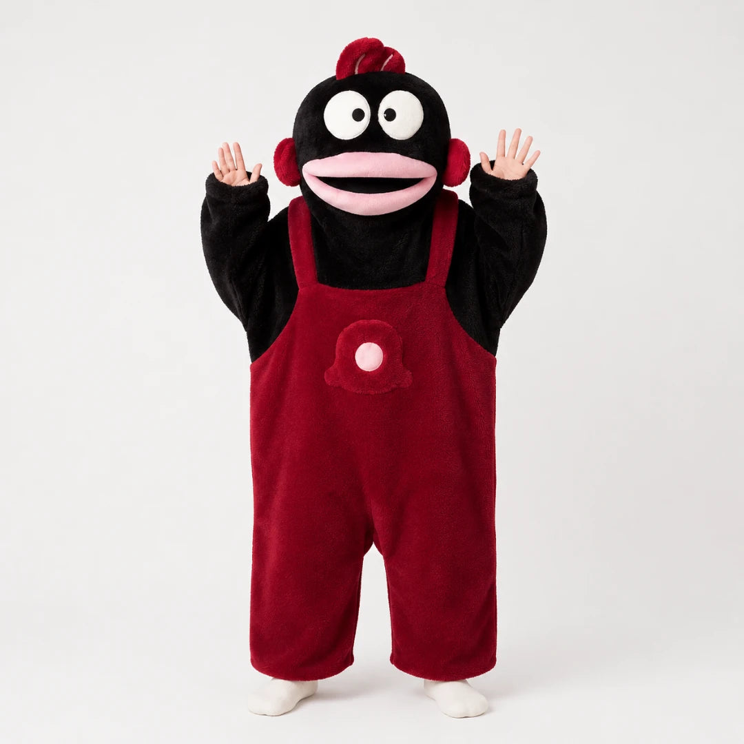 Josh & Tate - GoofSuit™ Big Mouth Monster Onesie - A person wearing a plush character costume resembling a black-and-red sock monkey, standing against a light gray studio background with hands raised and white socks visible at the feet.