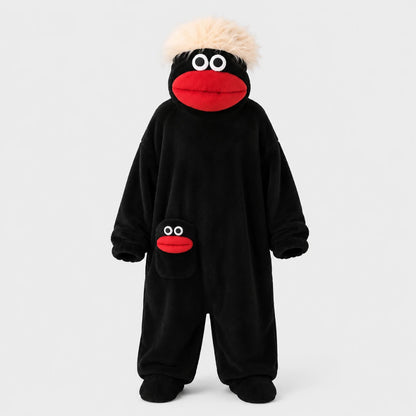 Josh & Tate - GoofSuit™ Big Mouth Monster Onesie - A black plush one-piece costume with a character face on the head and a matching face patch on the pocket, shown on a plain light gray studio background.