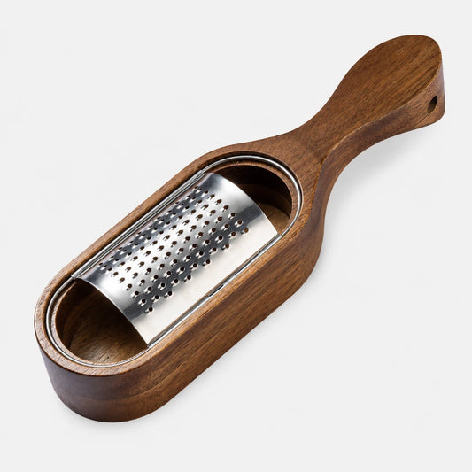 Josh & Tate - GrateTrough™ Wooden Cheese Grater - A wooden cheese grater with a stainless steel grating surface, shown on a clean light gray background.