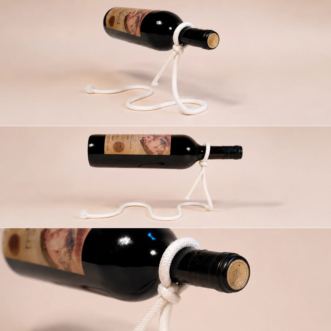 Josh & Tate - GravityKnot™ Floating Wine Holder - Three stacked close-up views of a dark wine bottle with a white cord wrapped around the neck and cork, shown against a plain warm beige background.