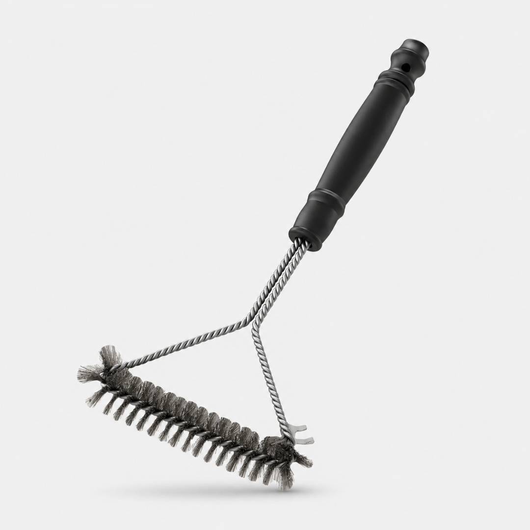 Josh & Tate - GrillBrush™ Stainless Grate Cleaner - A dual-sided cleaning brush with a black plastic handle, a twisted metal wire frame, and two bristle heads, one for scrubbing and one for rinsing, shown on a light gray background.