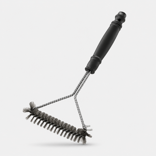 Josh & Tate - GrillBrush™ Stainless Grate Cleaner - A dual-sided cleaning brush with a black plastic handle, a twisted metal wire frame, and two bristle heads, one for scrubbing and one for rinsing, shown on a light gray background.