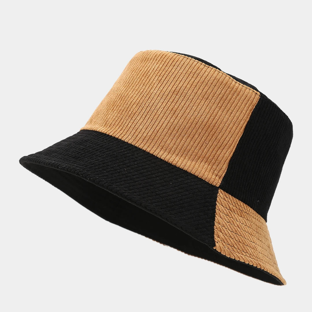 Josh & Tate - HalfTone™ Corduroy Bucket Hat - Bucket hat with black and beige sections on a light gray background