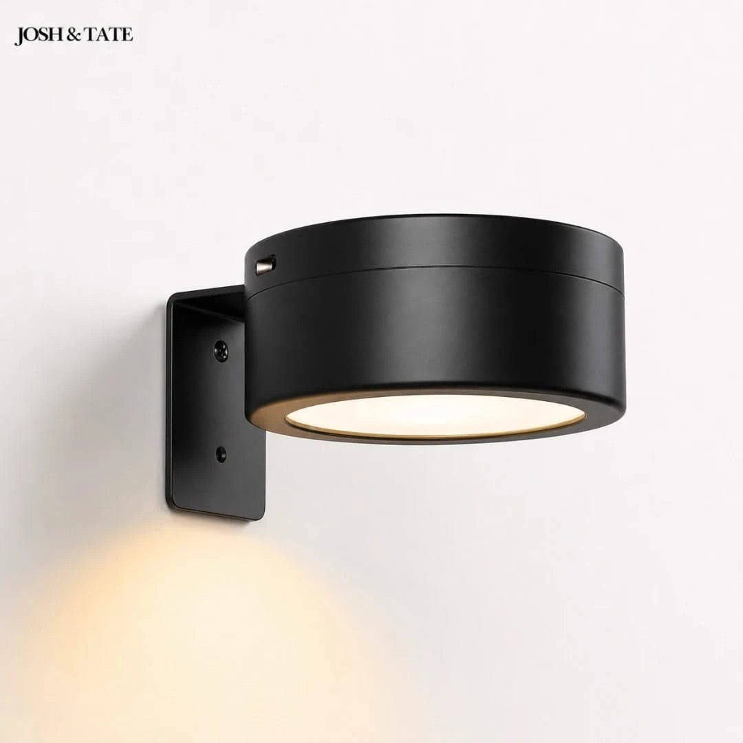 Josh & Tate - HaloMount™ Cordless Wall Light - Black wall-mounted light fixture on a white background with 'JOSH & TATE' branding.
