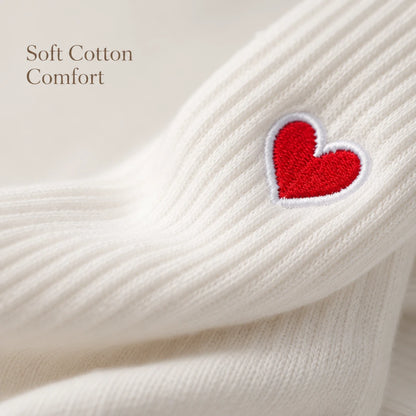 Josh & Tate - HeartStep™ Heart Crew Socks - White fabric with a red heart patch and 'Soft Cotton Comfort' text.