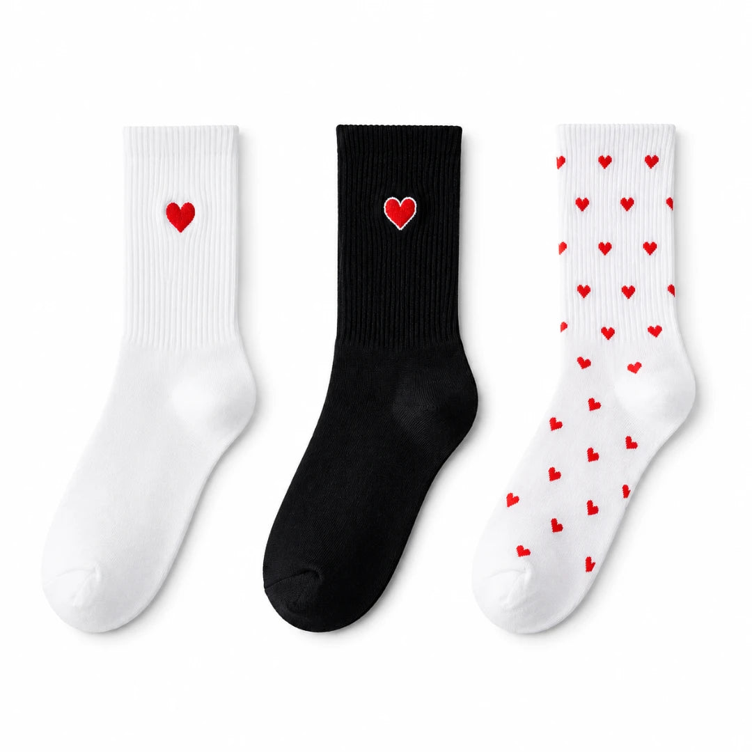 Josh & Tate - HeartStep™ Heart Crew Socks - Three socks with heart designs on a white background