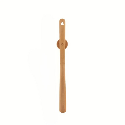 Wooden shoe horn on a white background
