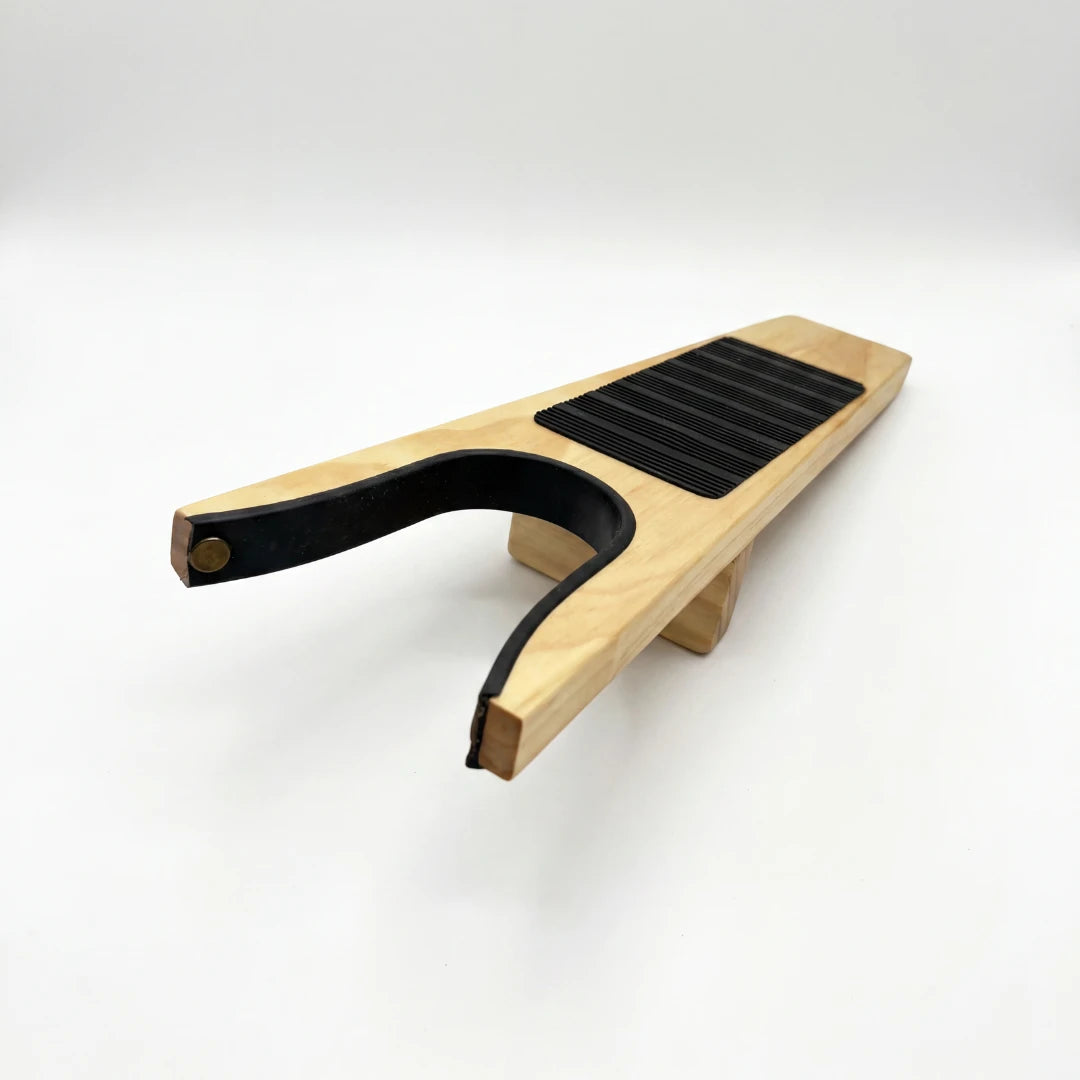 Josh & Tate - HeelHook™ Wooden Boot Jack - Wooden guitar capo on a white background