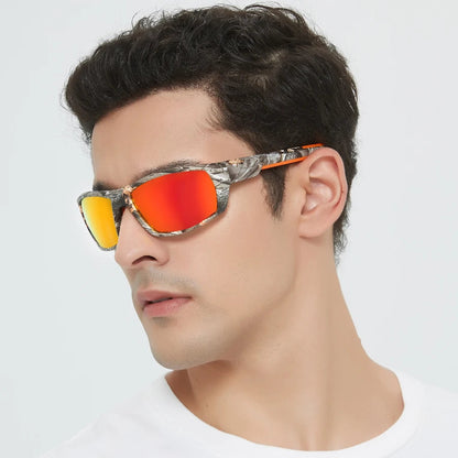 Man wearing a pair of sunglasses with orange lenses and camouflage frame on a white background