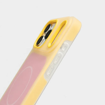 Josh & Tate - JellyHalo™ MagSafe iPhone Case - Close-up of a phone case with a pastel yellow border, a translucent pink back panel, and a clear side bumper on a light gray background.