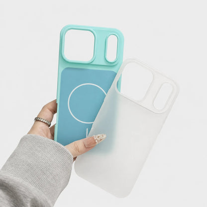 Josh & Tate - JellyHalo™ MagSafe iPhone Case - A hand wearing a gray long-sleeve shirt holds two phone cases against a clean white background. One case is a translucent aqua blue with a solid blue magnetic strip and white circular logo, while the other is a semi-translucent frosted white case.