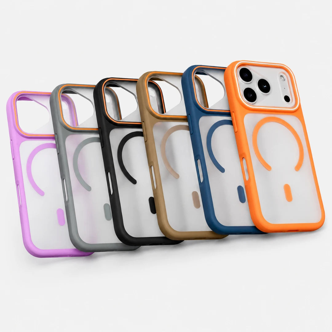 Josh & Tate - JoyRing™ MagSafe iPhone Case - Six clear phone cases with colored magnetic ring accents are arranged in a fan shape on a light gray background. The cases feature purple, gray, black, brown, blue, and orange borders.