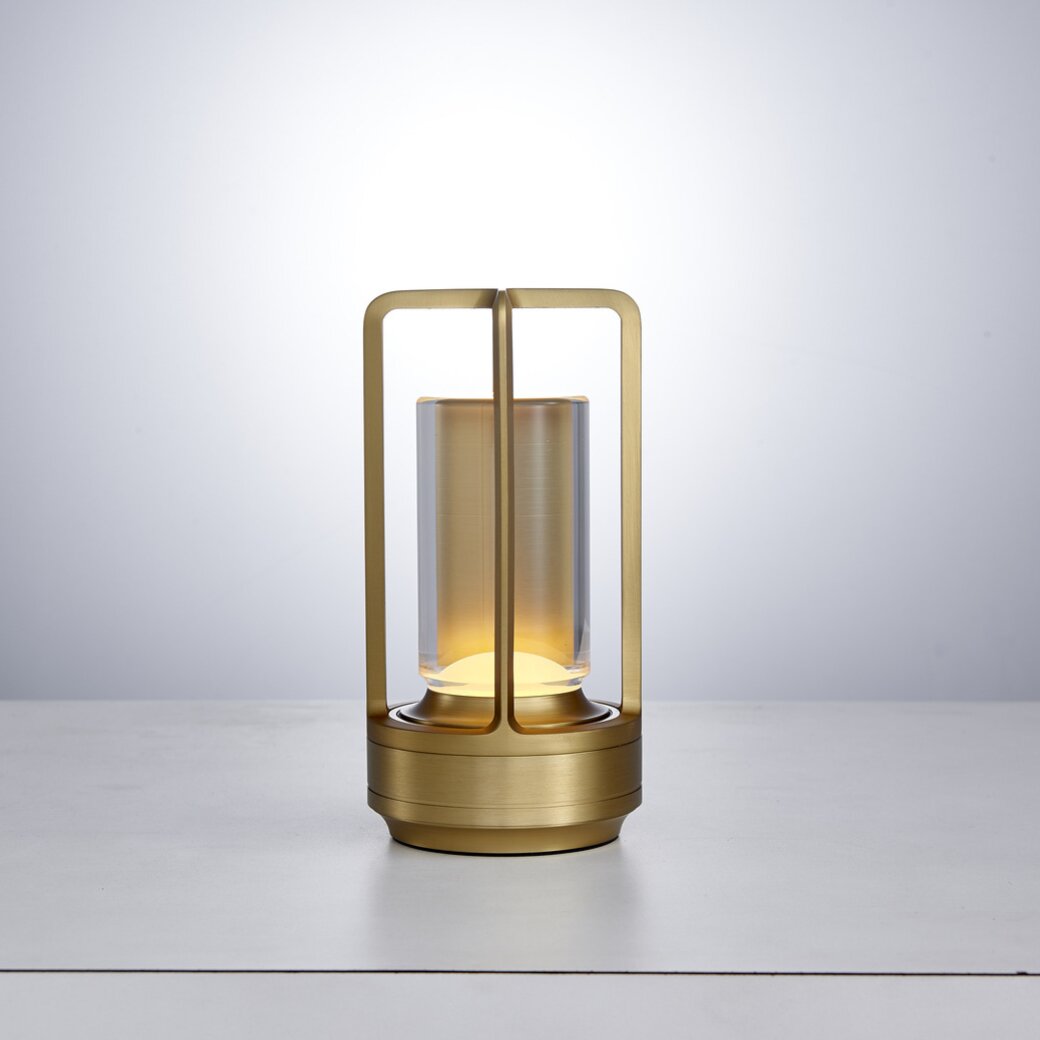 Gold lantern with a soft glow on a white background