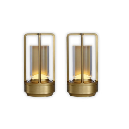 Two gold outdoor lanterns on a white background
