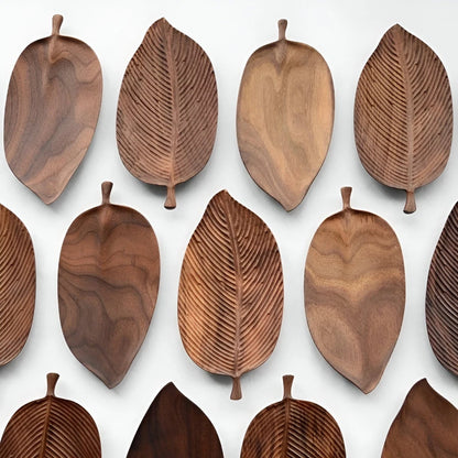 Josh & Tate - Leaf Shaped Wooden Serving Tray - Wooden leaf-shaped trays arranged in a grid on a white background